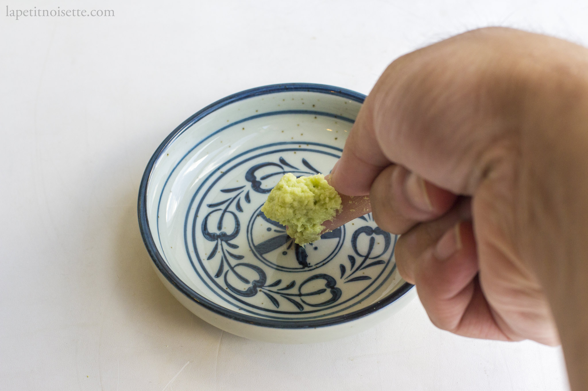 The technique for serving wasabi at a restaurant using your fingers.