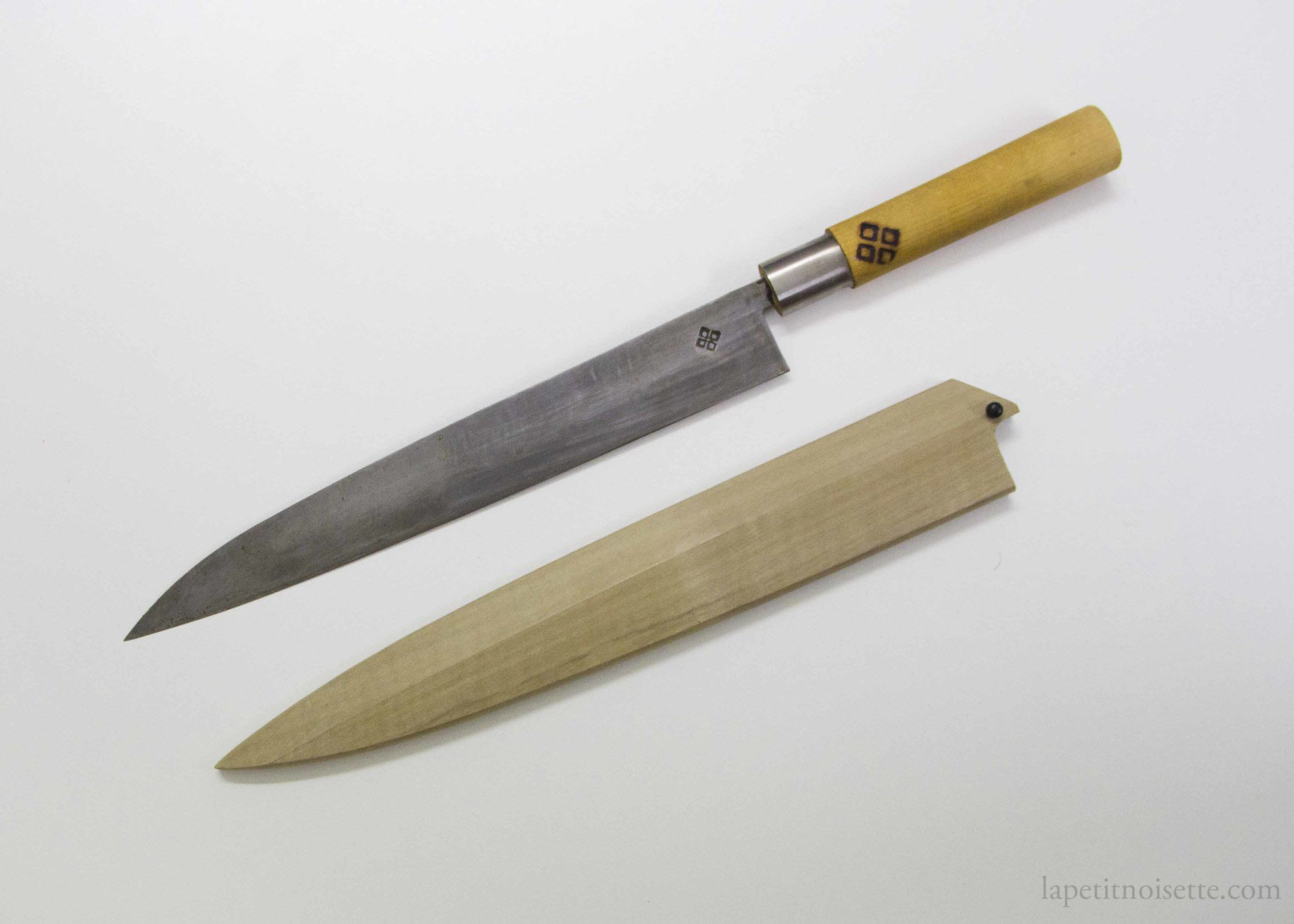 A custom made sujihiki slicing knife by Toshio Ohba.