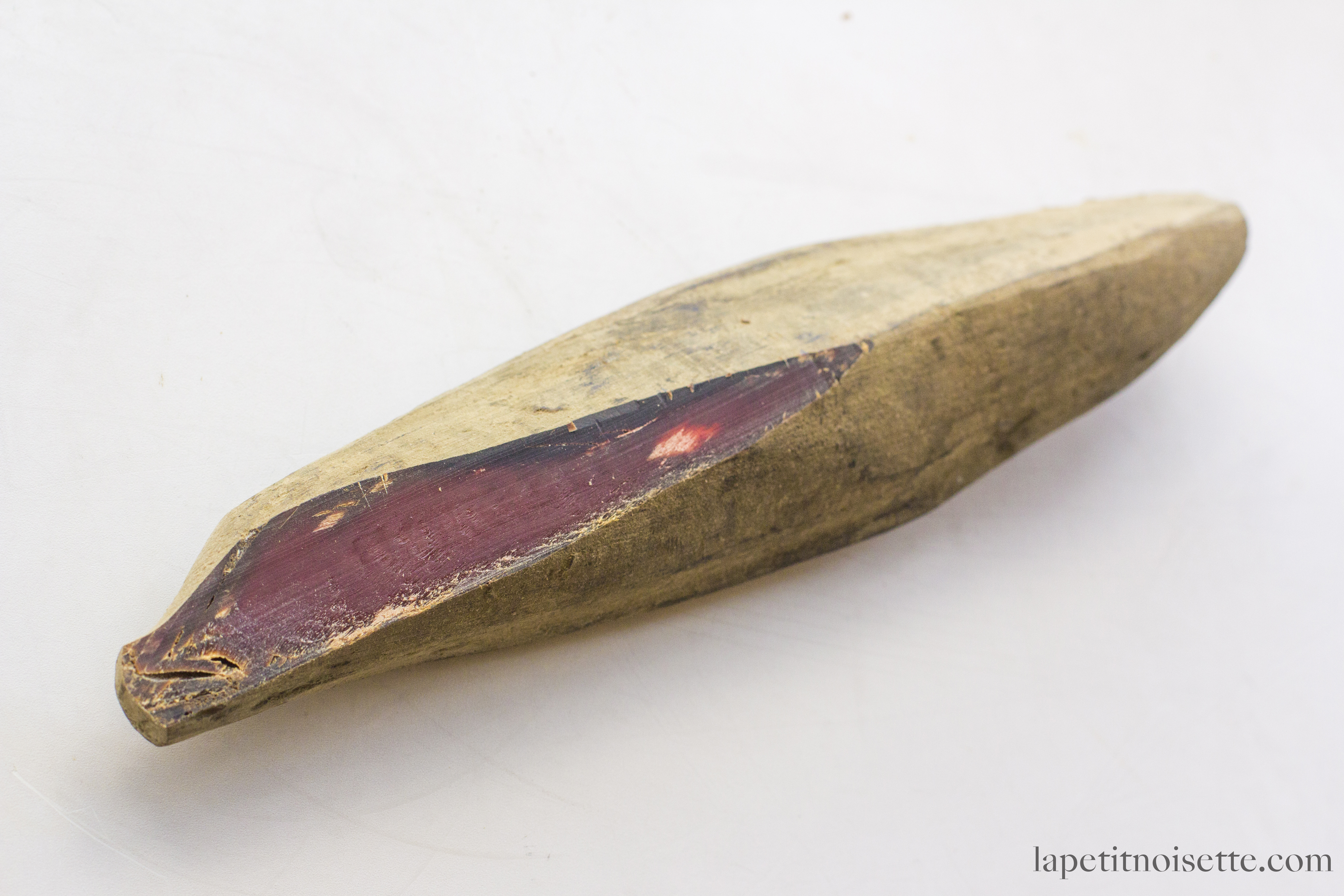 The beautiful ruby color inside of a freshly shaven Katsuobushi. It slowly turns brown with oxidation.