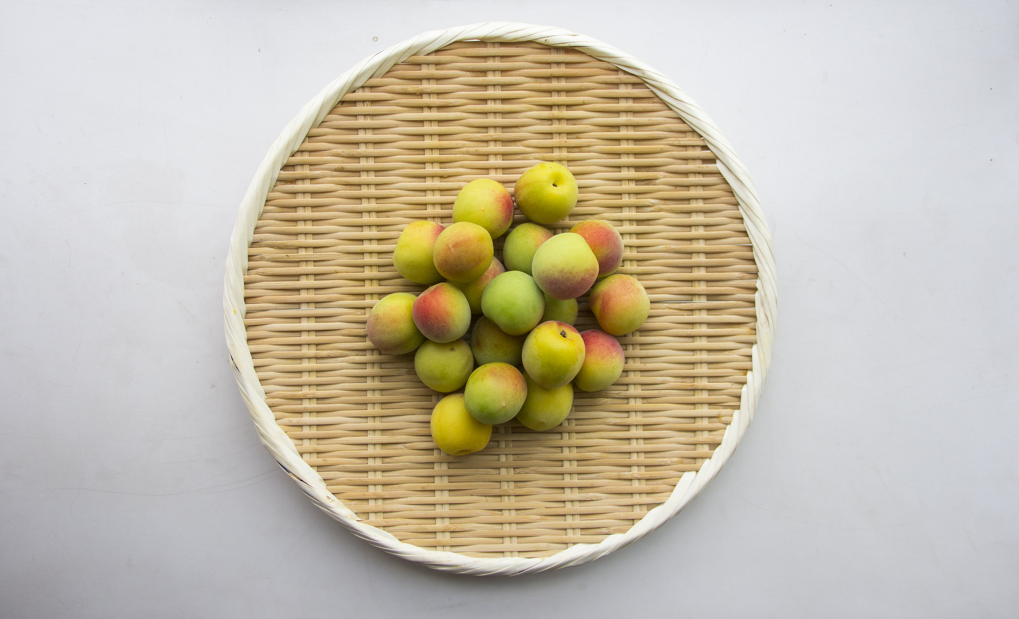Unripe Japanese plums