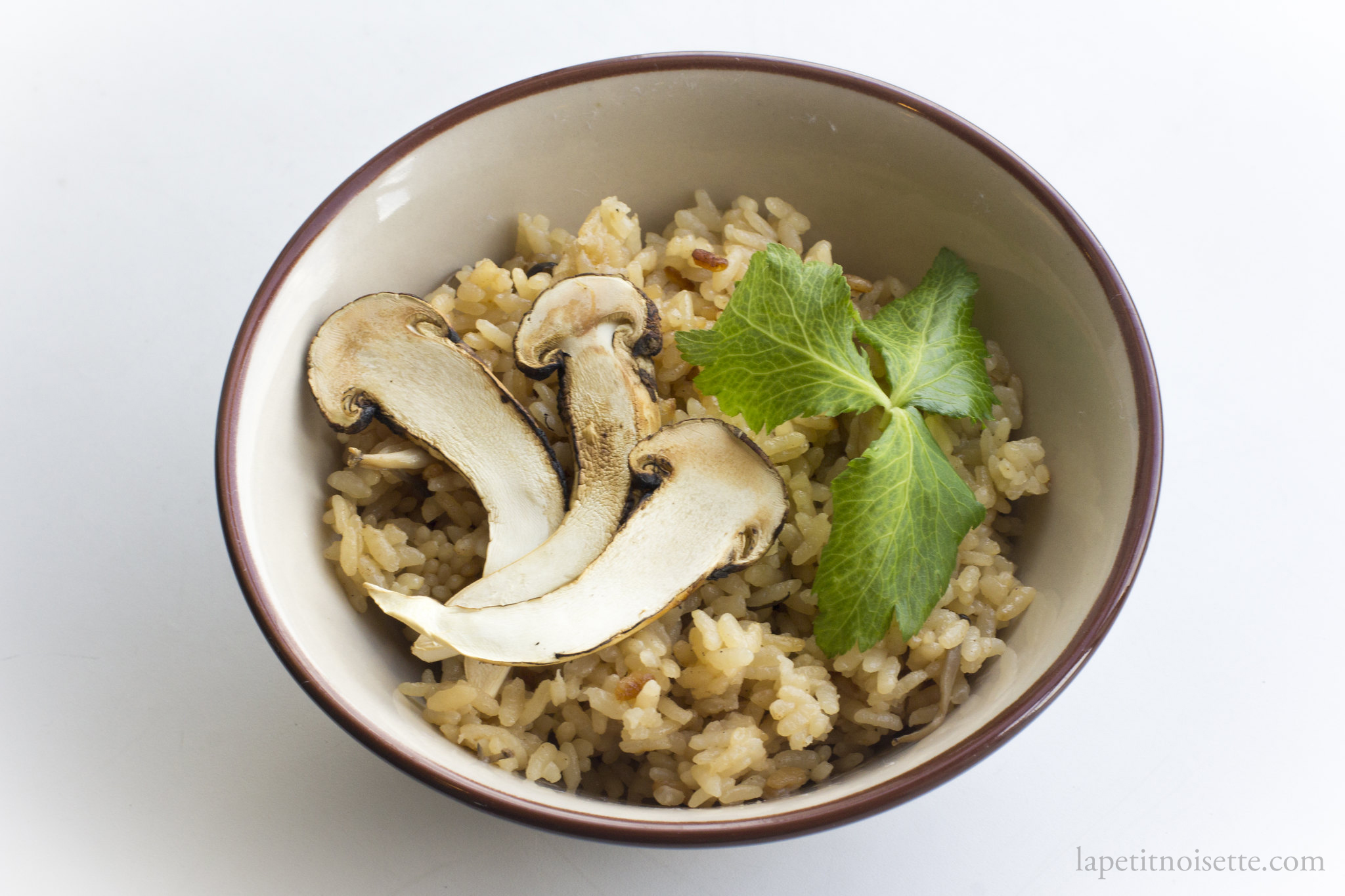 Japanese matsutake rice served with mitsuba.