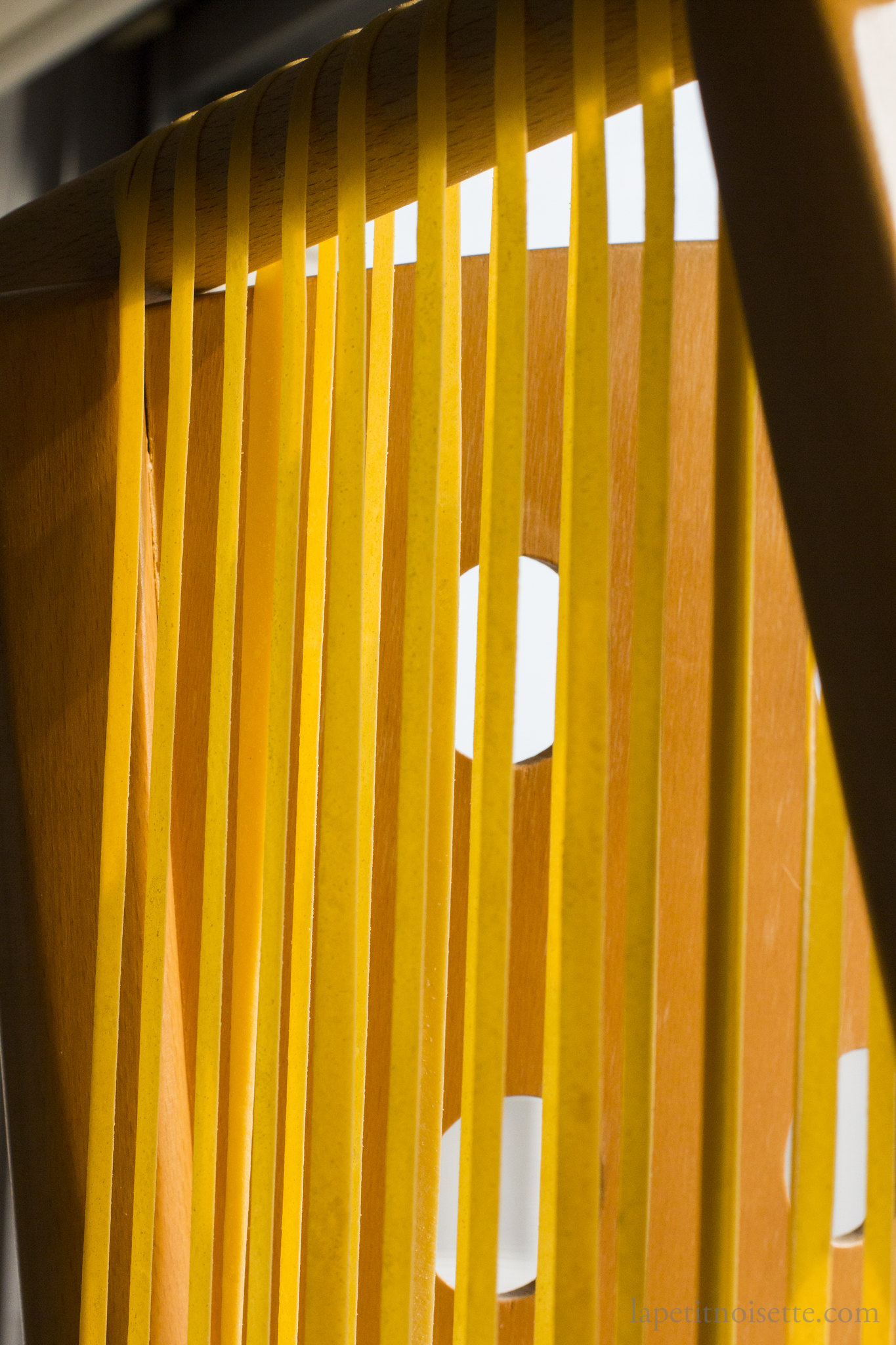 Fresh egg pasta drying in the sun.