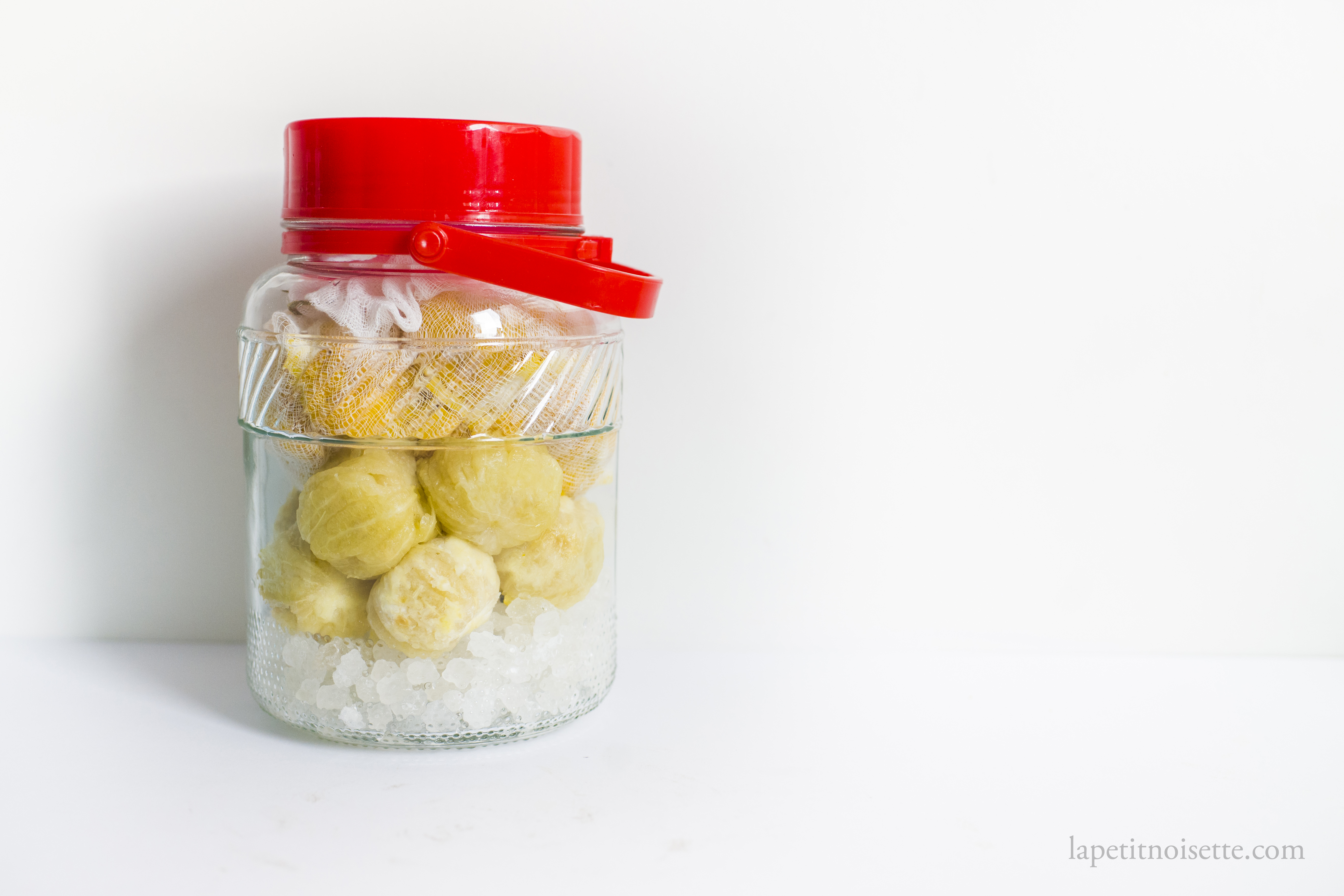 Yuzushu being made with rock sugar and yuzu peel.