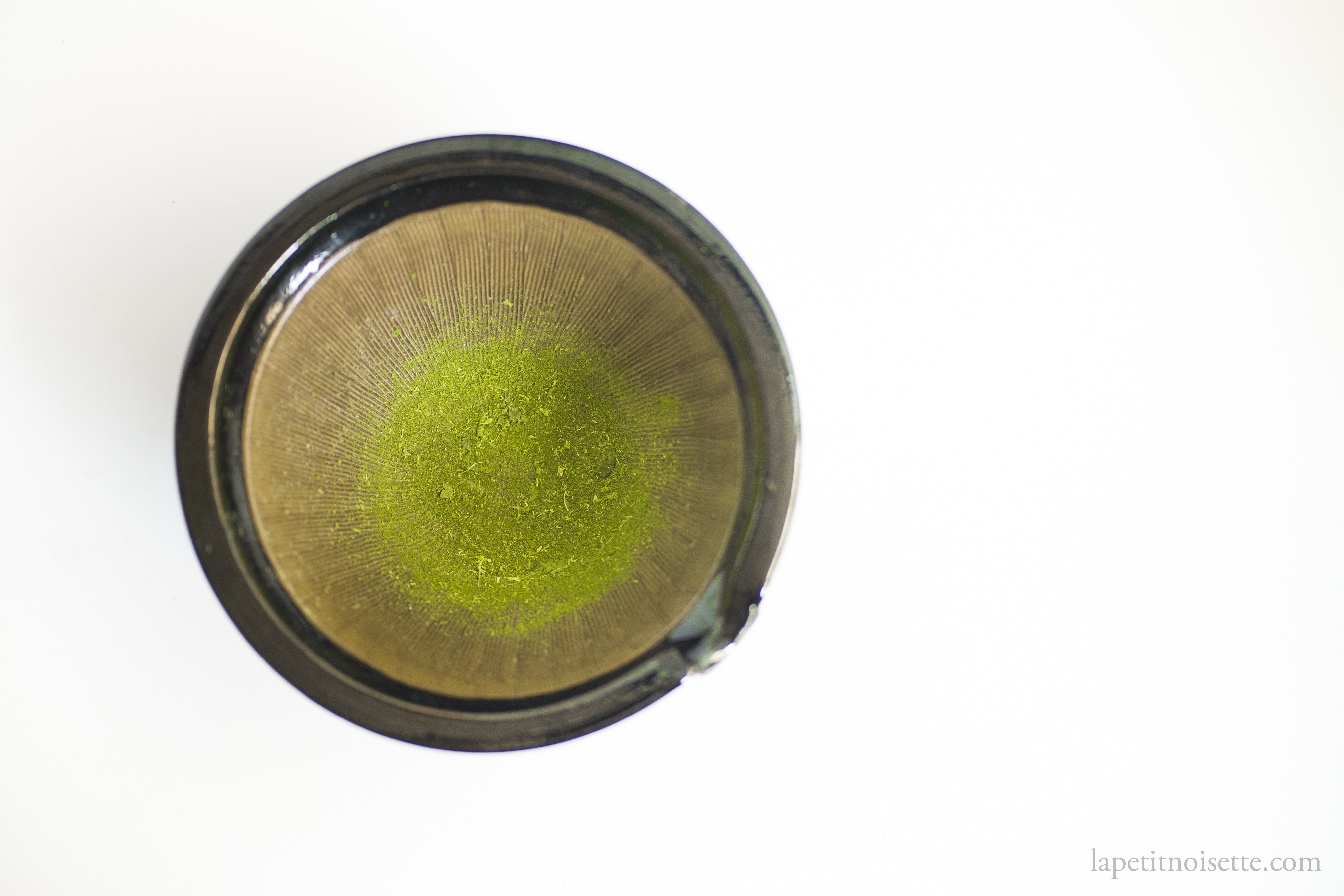 Mulberry matcha made in a mortar.