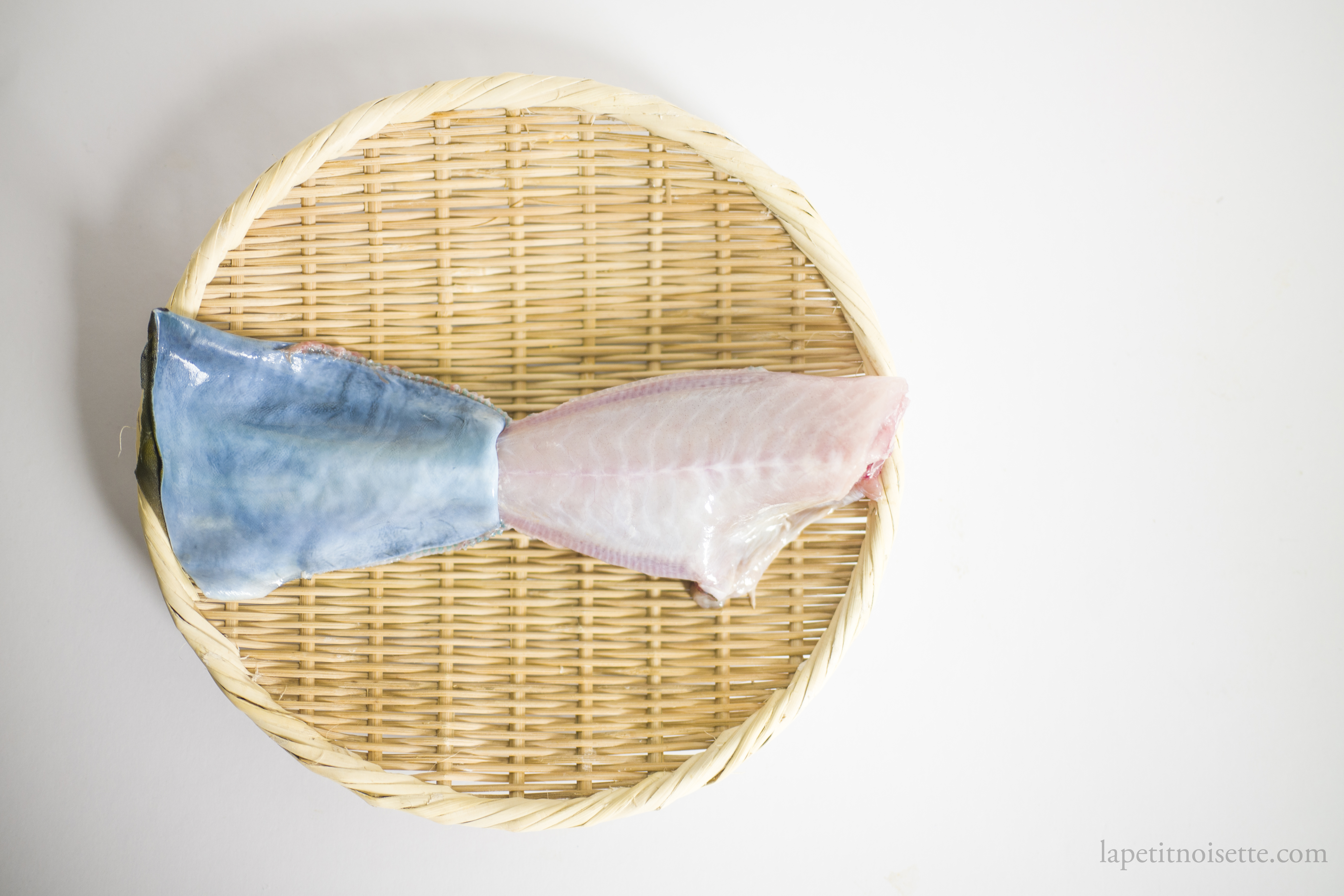 the skin of a japanese kawahagi fish can be removed by pulling.