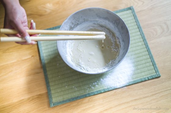 The optimal consistency for tempura batter dripping off chopsticks.