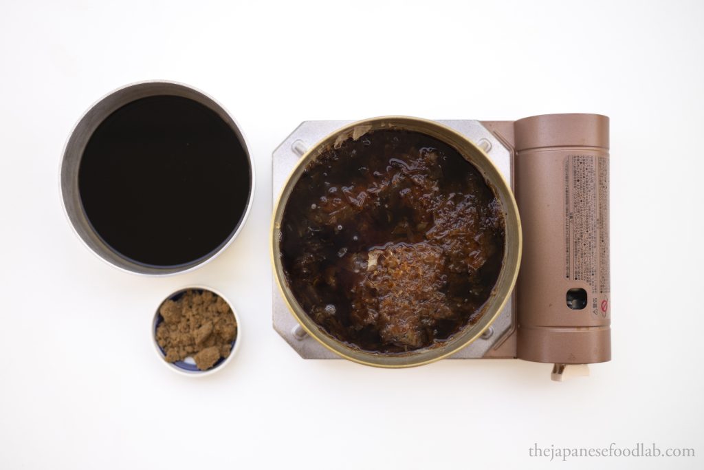 Dashi made with a base of mirin, sake and katsuobushi being made for tendon tare sauce. 